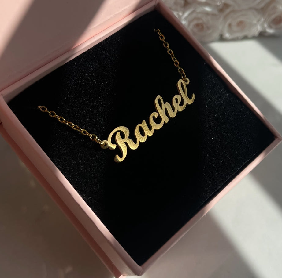 Gold 'Rachel' necklace in a pink jewelry box