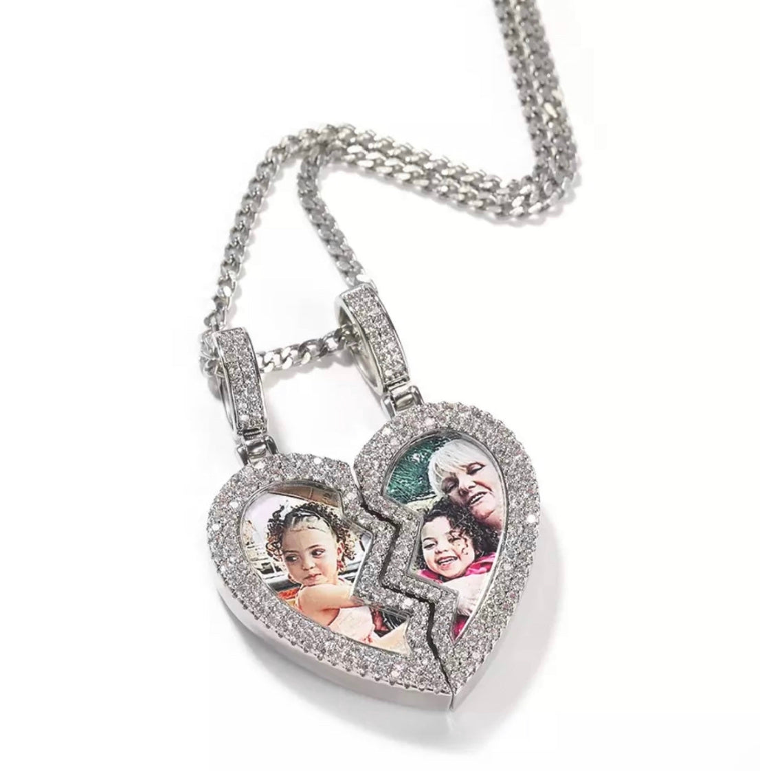 A silver-tone custom photo pendant necklace with a heart-shaped frame and cubic zirconia accents, featuring two separate photos side by side.